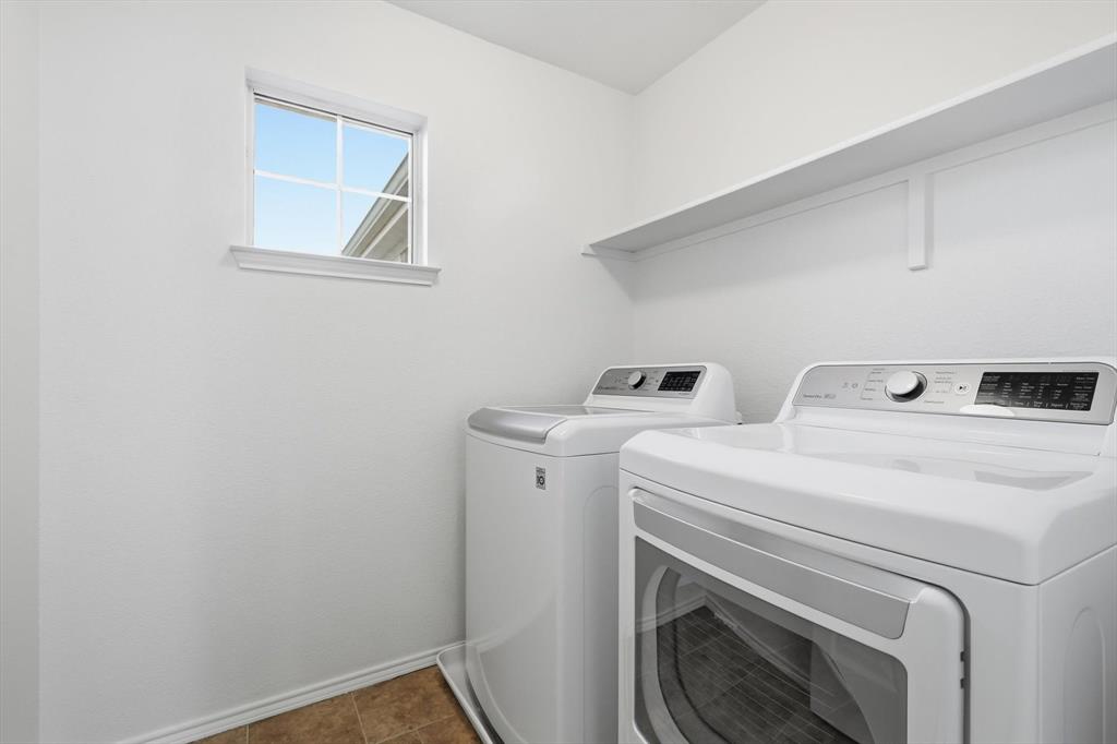 6000 Lost Valley Drive The Colony, TX 75056 - Photo 17 of 40 a utility room with dryer and washer