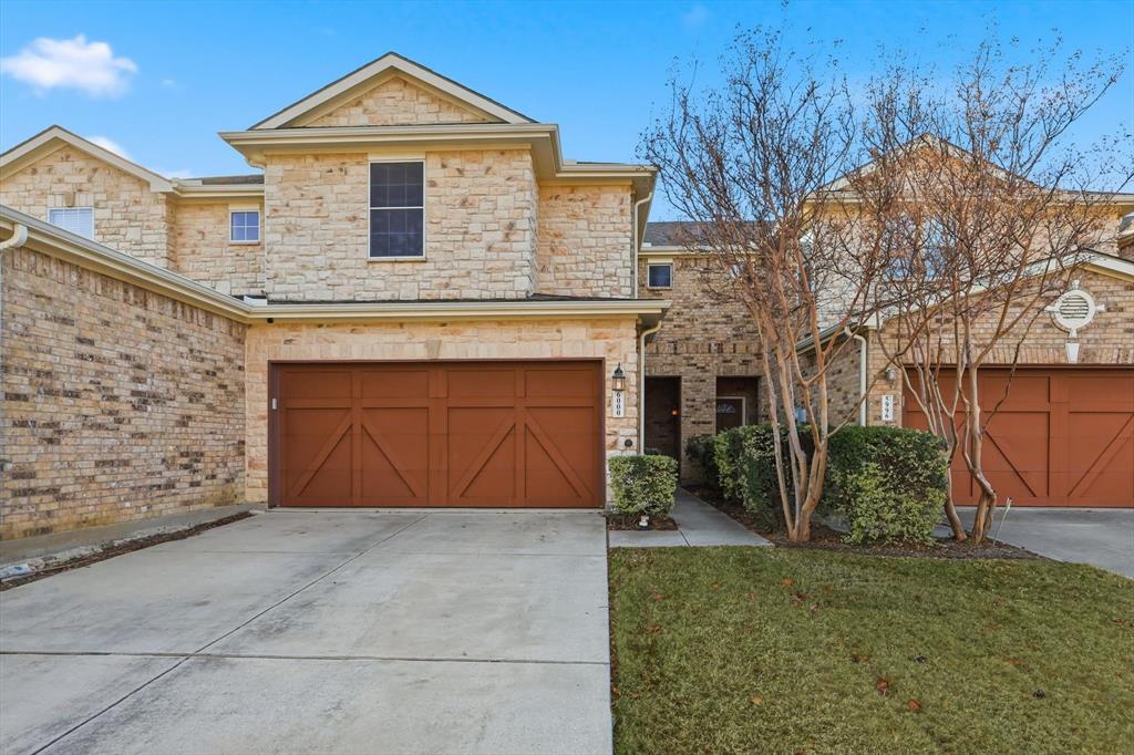 6000 Lost Valley Drive The Colony, TX 75056 - Photo 2 of 40 a front view of a house with a yard and garage