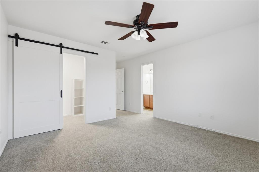 6000 Lost Valley Drive The Colony, TX 75056 - Photo 22 of 40 a view of a livingroom with a ceiling fan