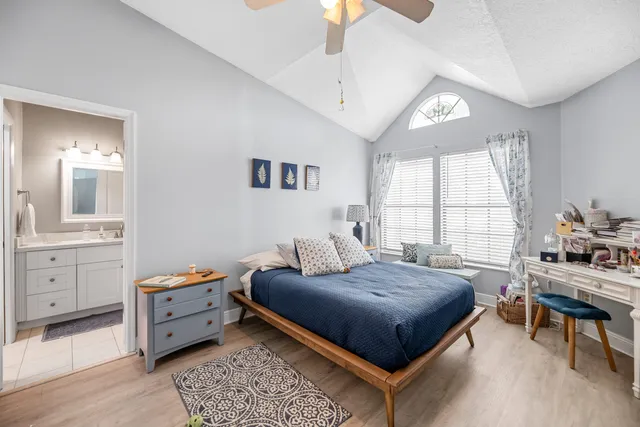 a living room with furniture and windows