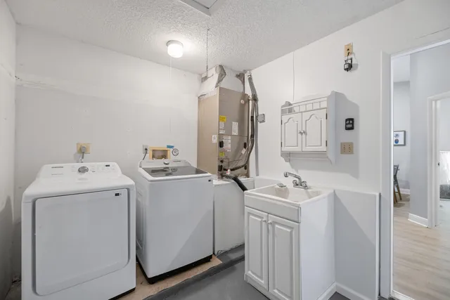 a view of utility room with washer and dryer