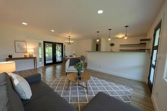 a living room with furniture and a table