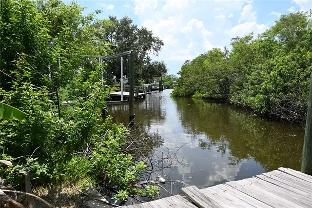 a wooden pier with lake view
