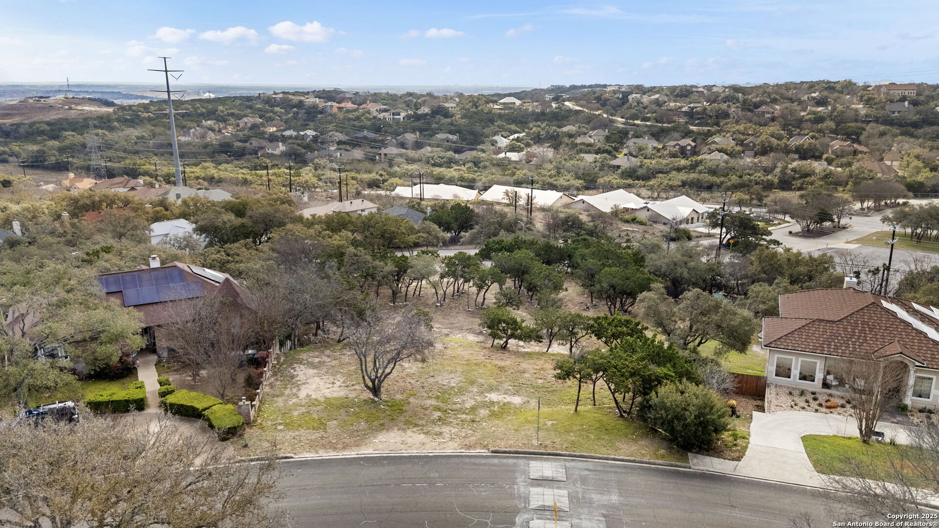 6543 Wagner Way San Antonio, TX 78256 - Photo 1 of 20 an aerial view of residential houses with outdoor space and parking
