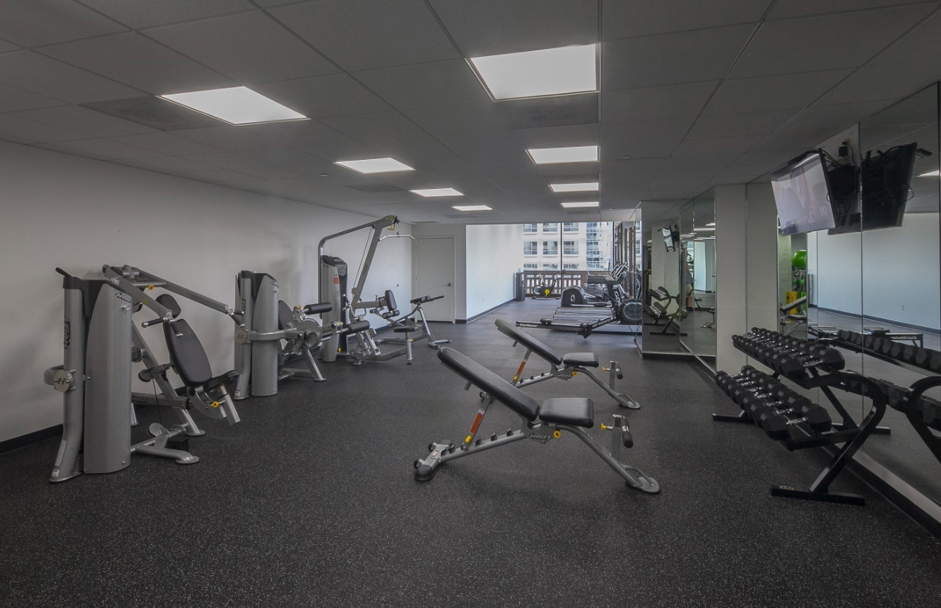 2016 Main Street, Unit 2507 Houston, TX 77002 - Photo 29 of 32 a view of a room with gym equipment
