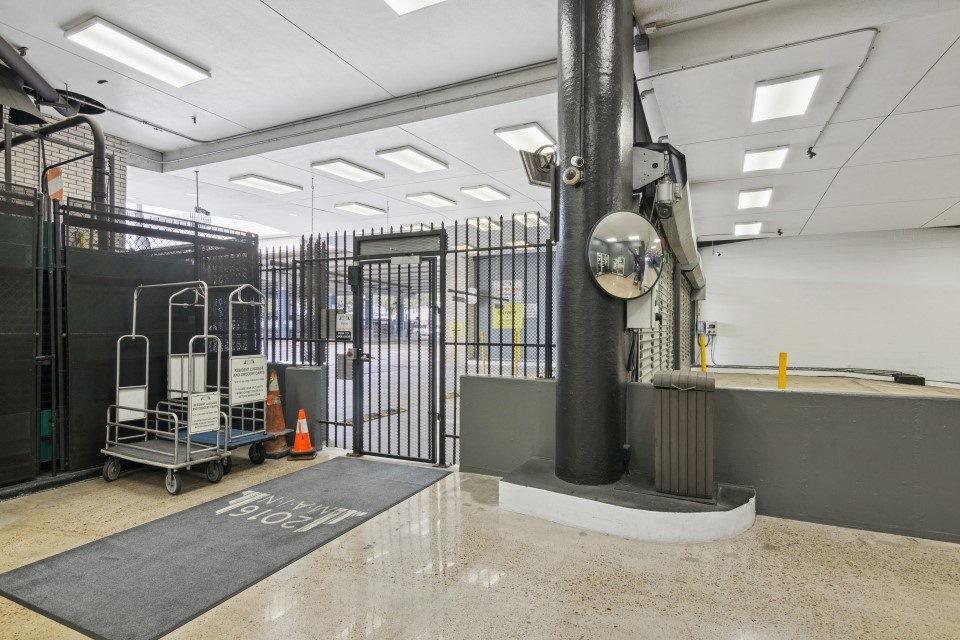 2016 Main Street, Unit 2507 Houston, TX 77002 - Photo 31 of 32 a view of entryway with a chandelier
