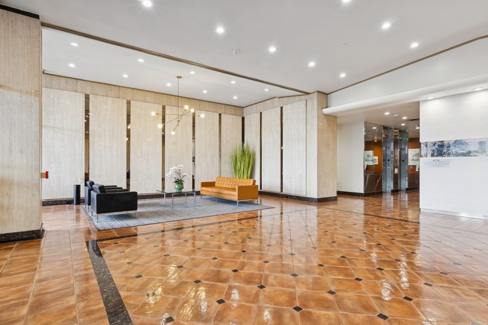 2016 Main Street, Unit 2507 Houston, TX 77002 - Photo 4 of 32 a view of a living room with a large window