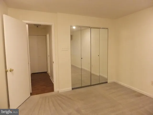 a balcony with trees in front of it