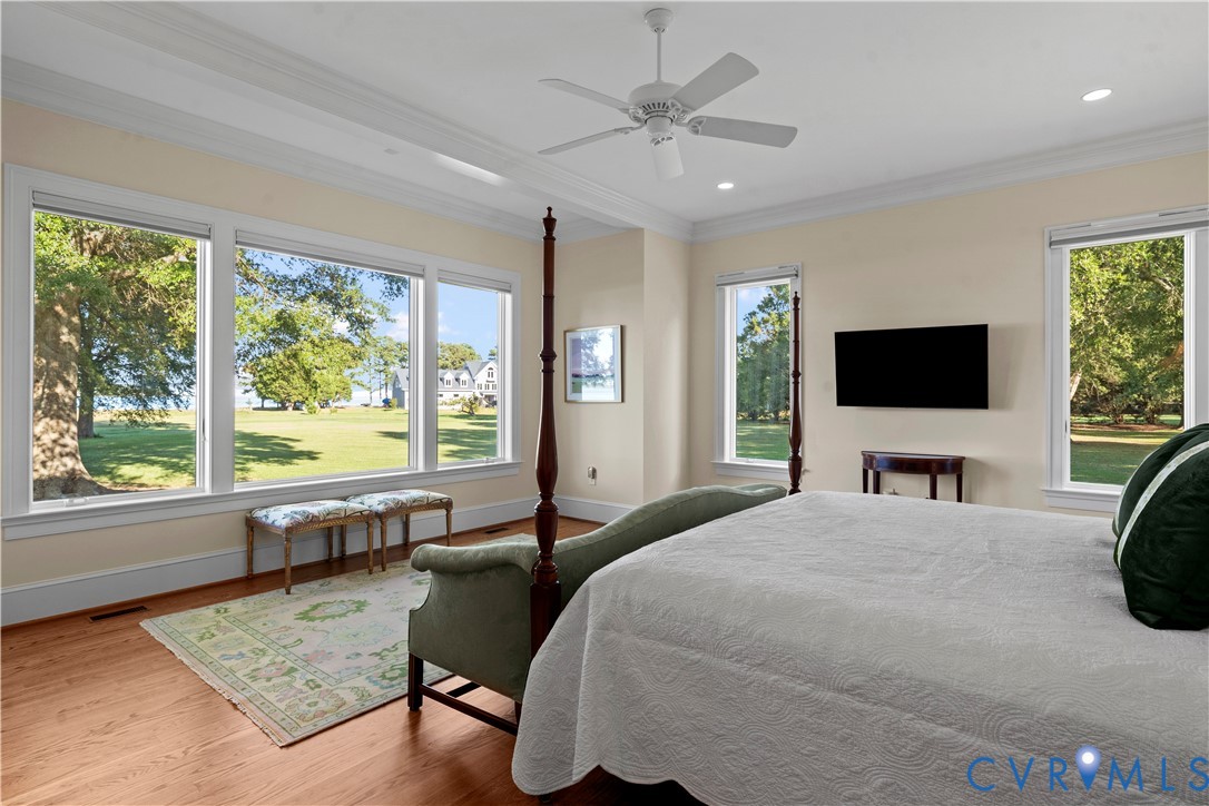 2515 Fleet's Bay Road White Stone, VA 22578 - Photo 24 of 74 a view of a bedroom with furniture and windows