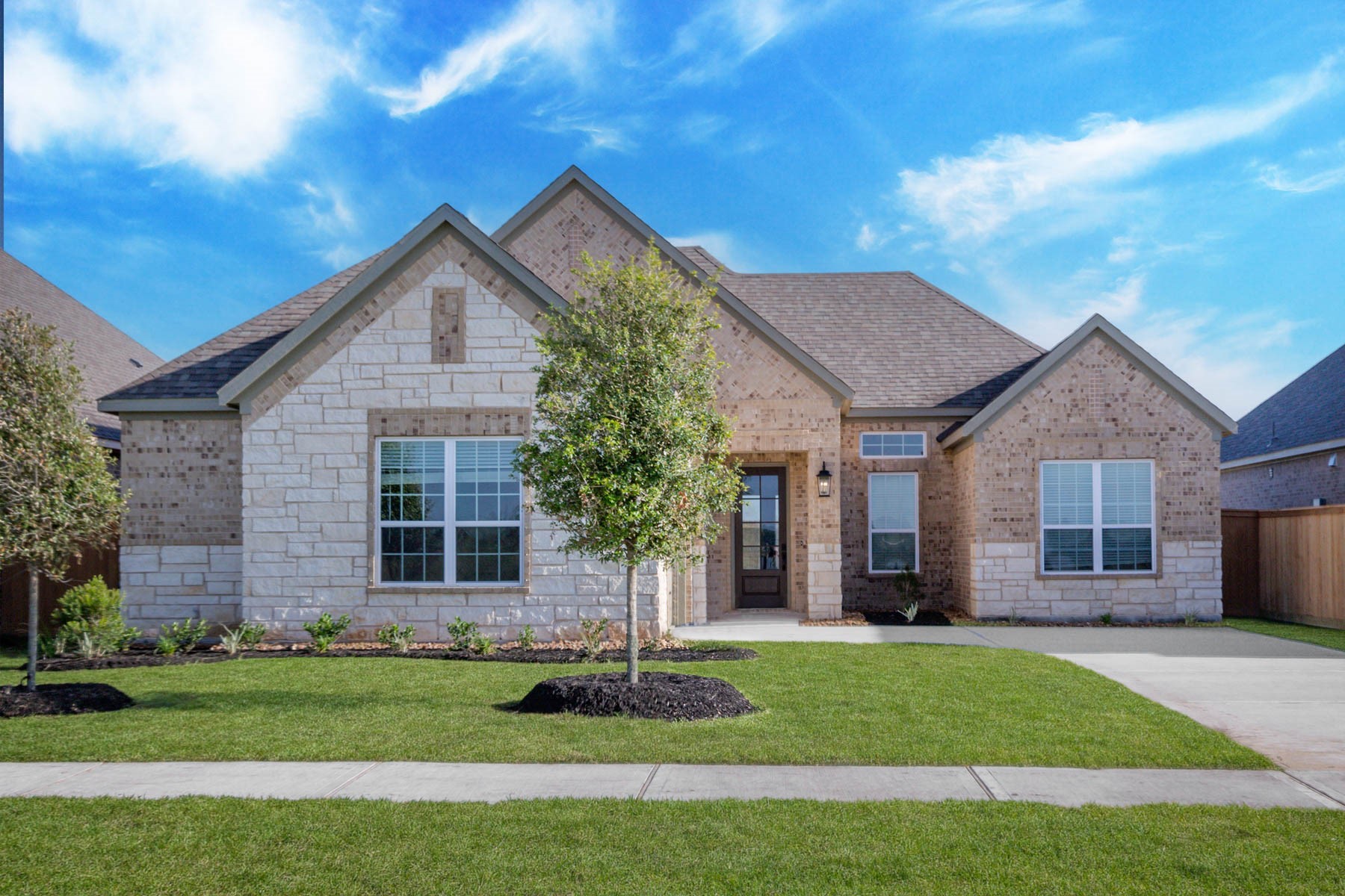 1918 June Lk Lane Iowa Colony, TX 77583 - Photo 1 of 11 a front view of a house with a yard