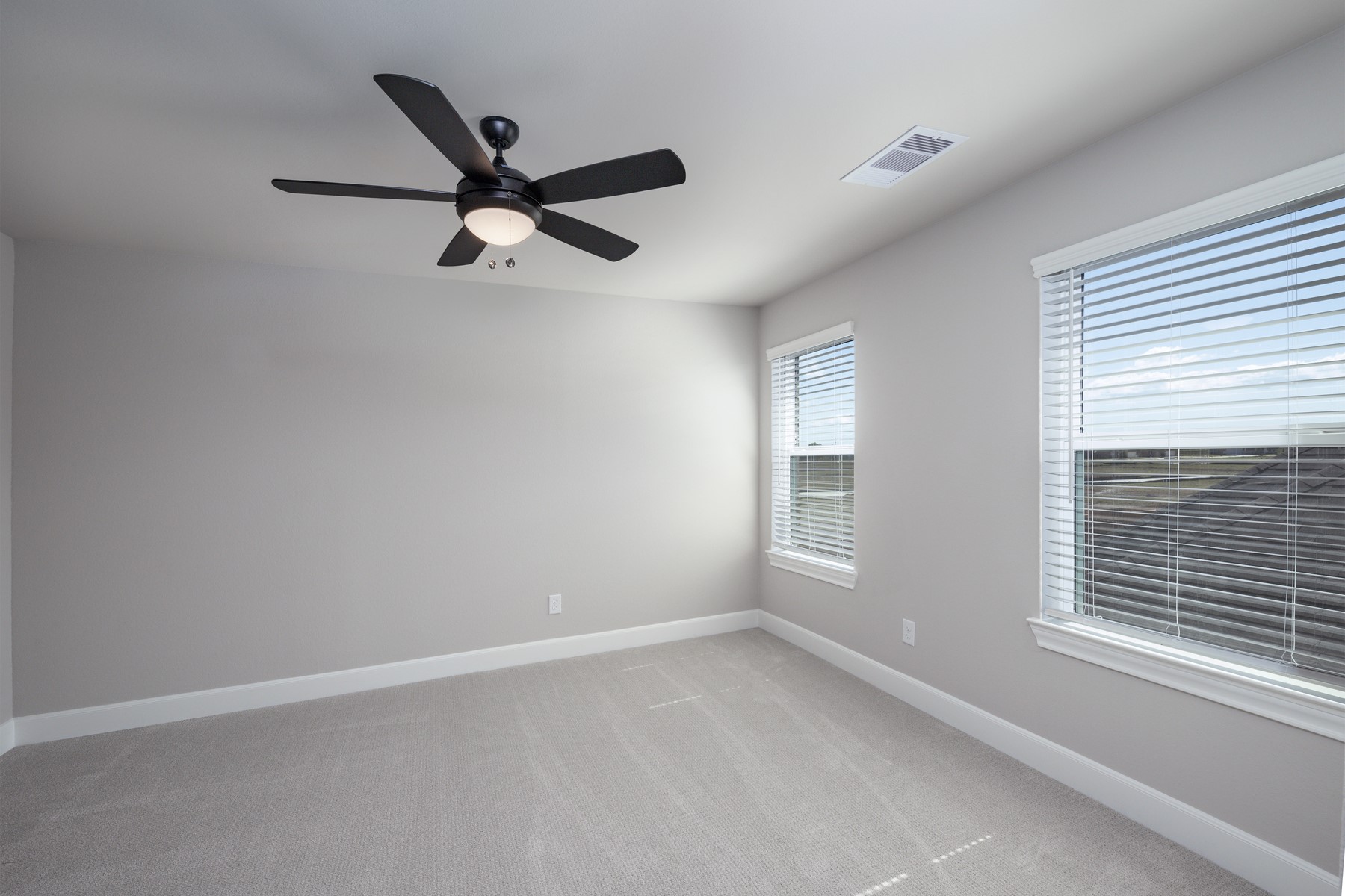 1918 June Lk Lane Iowa Colony, TX 77583 - Photo 5 of 11 a view of a livingroom with a ceiling fan and window