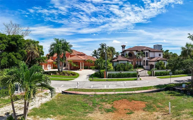 a view of house with garden space and trees