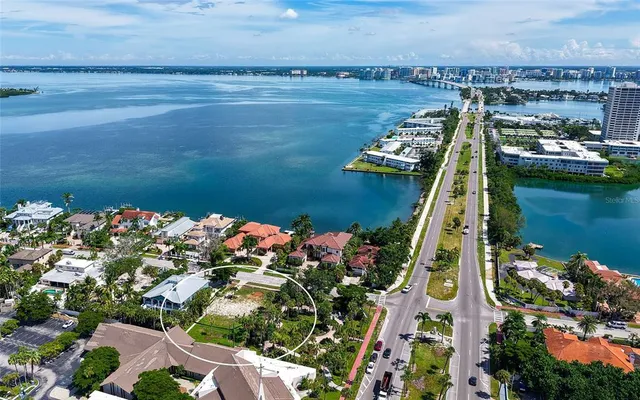 a view of a lake with a table and a chair