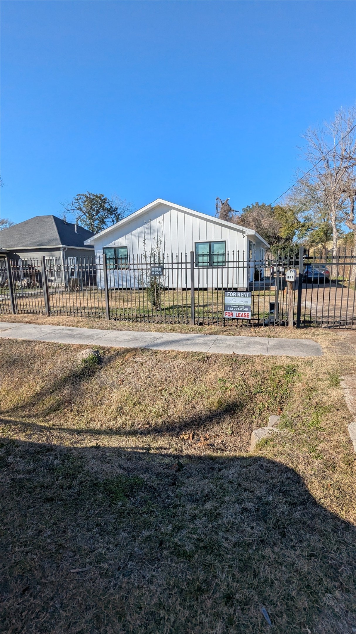 731 Post Street Houston, TX 77022 - Photo 2 of 11 a front view of residential houses with outdoor space and swimming pool