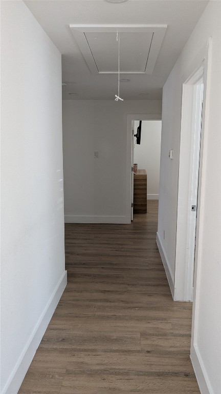731 Post Street Houston, TX 77022 - Photo 22 of 25 a view of a hallway with wooden floor and staircase