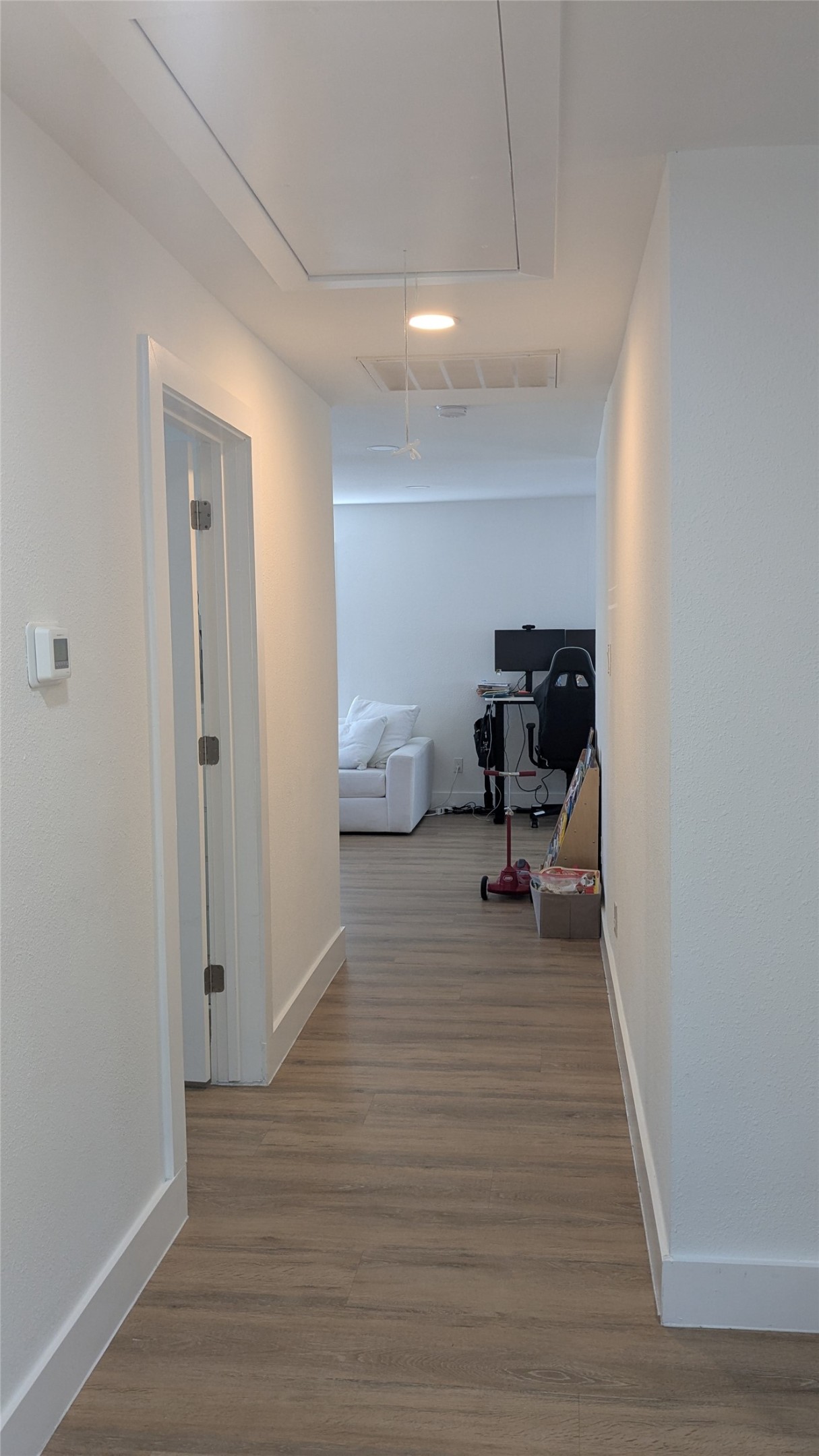 731 Post Street Houston, TX 77022 - Photo 4 of 11 a room that has a couch and a chair in it