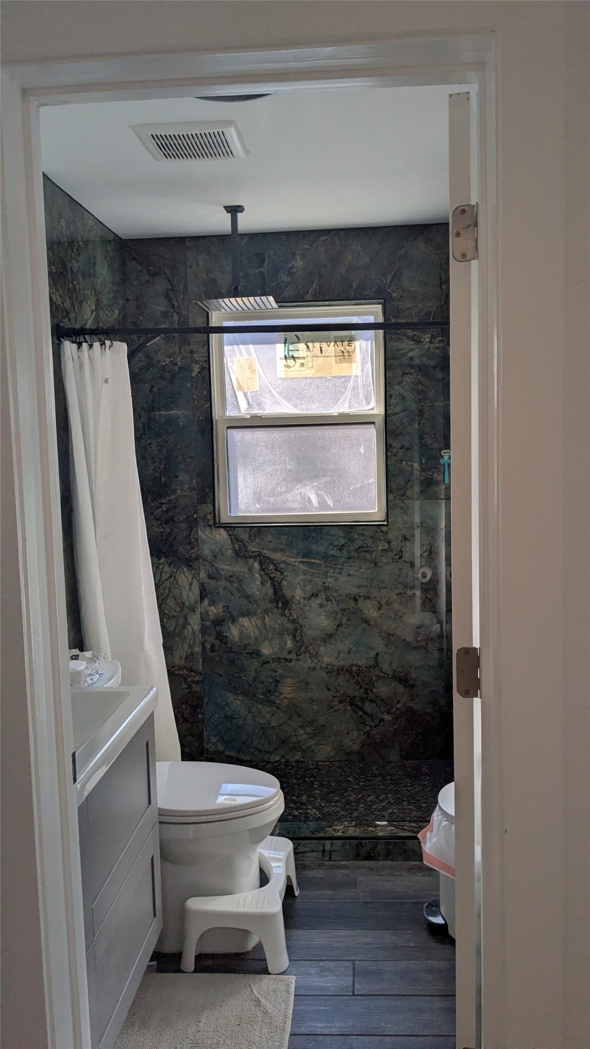 731 Post Street Houston, TX 77022 - Photo 5 of 11 a bathroom with a toilet and a shower