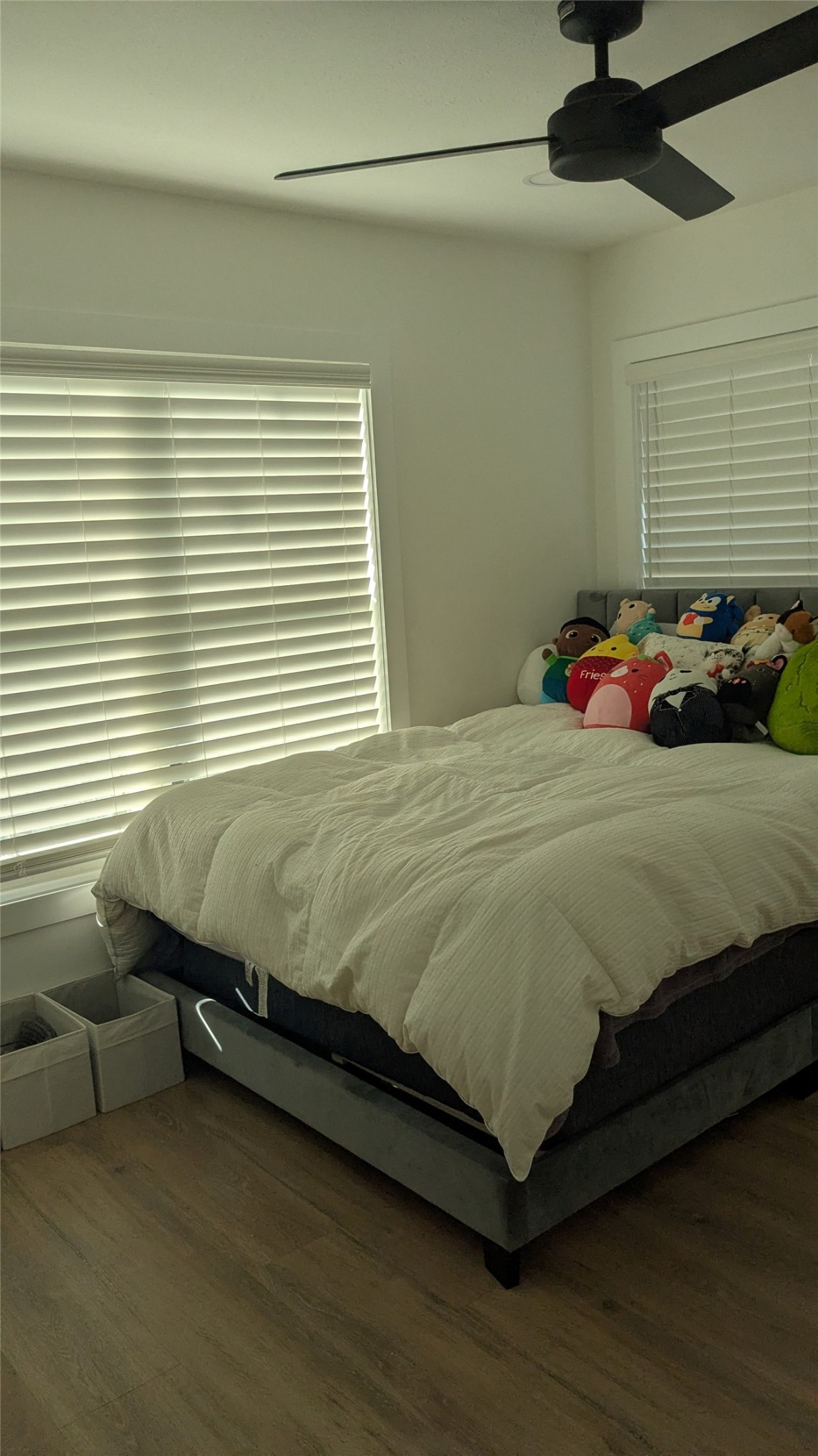 731 Post Street Houston, TX 77022 - Photo 7 of 11 a bed sitting in a bedroom next to a window