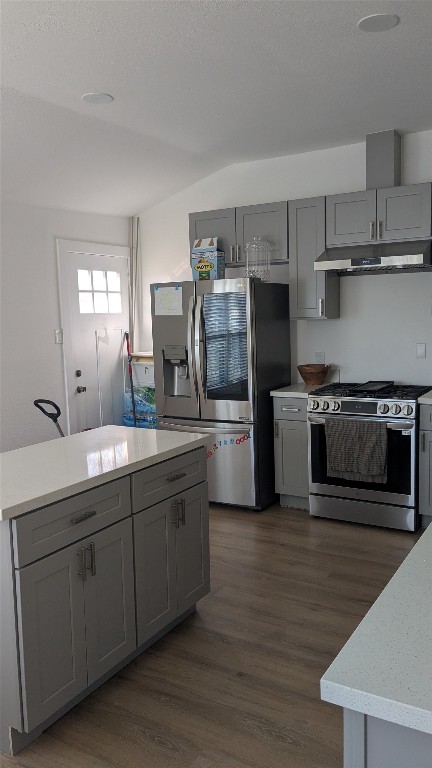 731 Post Street Houston, TX 77022 - Photo 8 of 25 a kitchen with stainless steel appliances a sink cabinets and a wooden floor