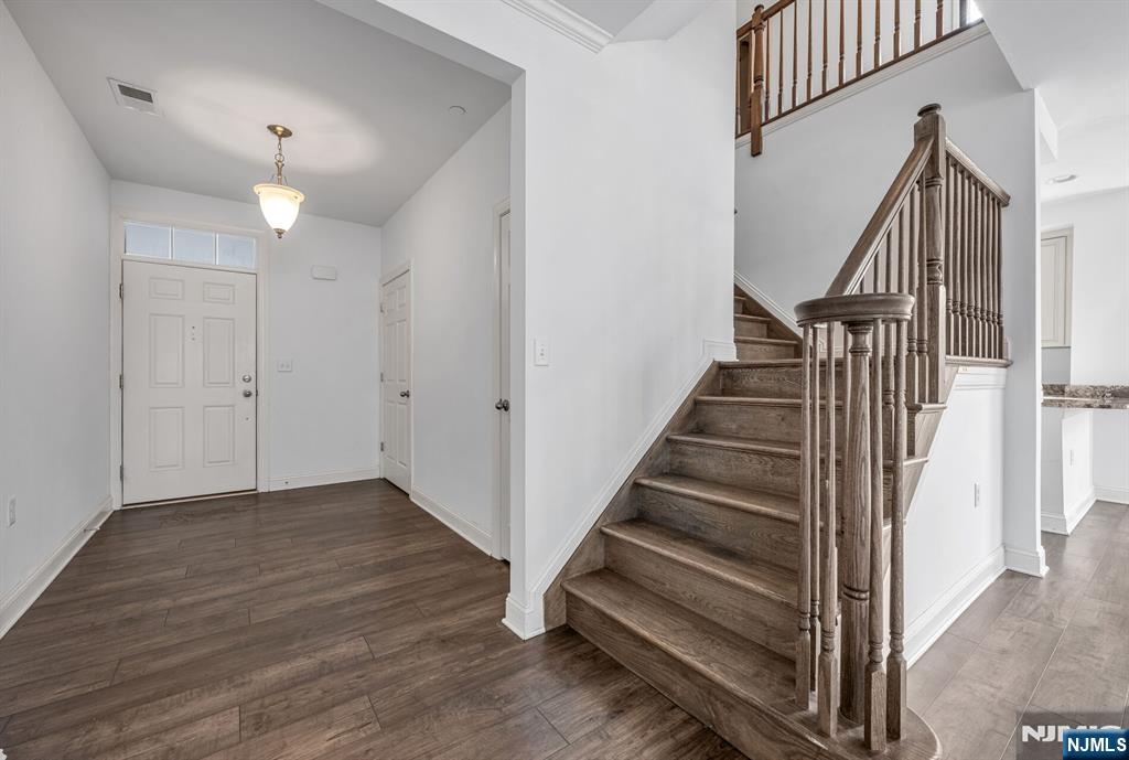 63 Autumn Way, Unit 35 Montvale, NJ 07645 - Photo 2 of 27 a view of entryway and hall with wooden floor