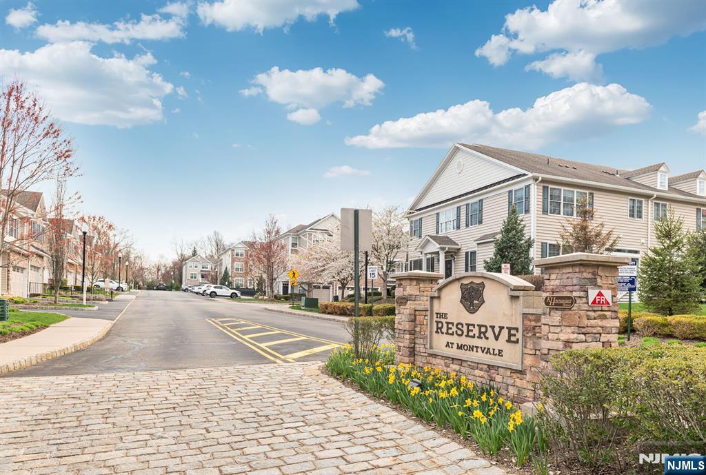 63 Autumn Way, Unit 35 Montvale, NJ 07645 - Photo 25 of 27 a view of a street with a building in the background