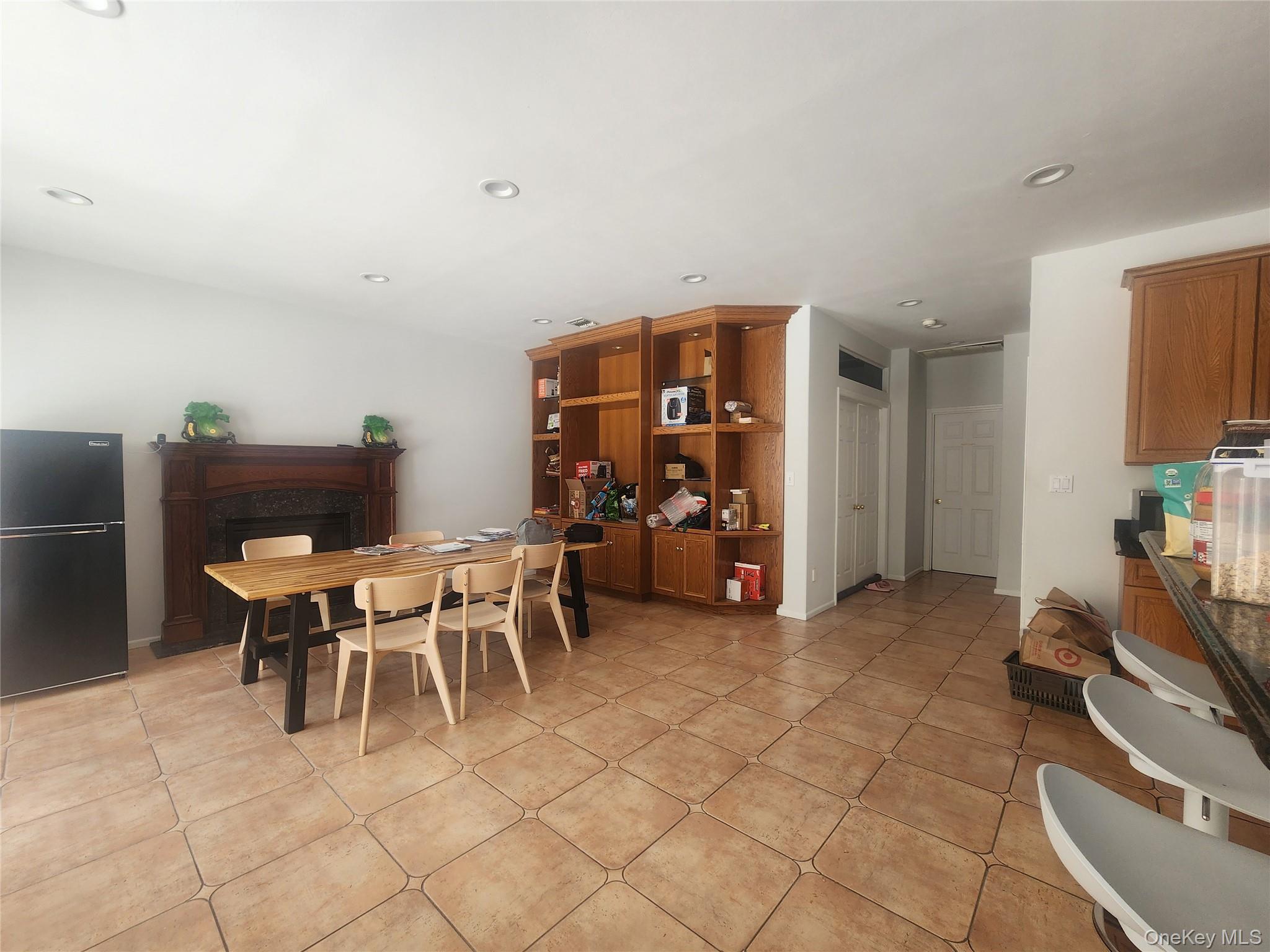 3 Arbor Field Way Lake Grove, NY 11755 - Photo 2 of 12 a view of a dining room with furniture