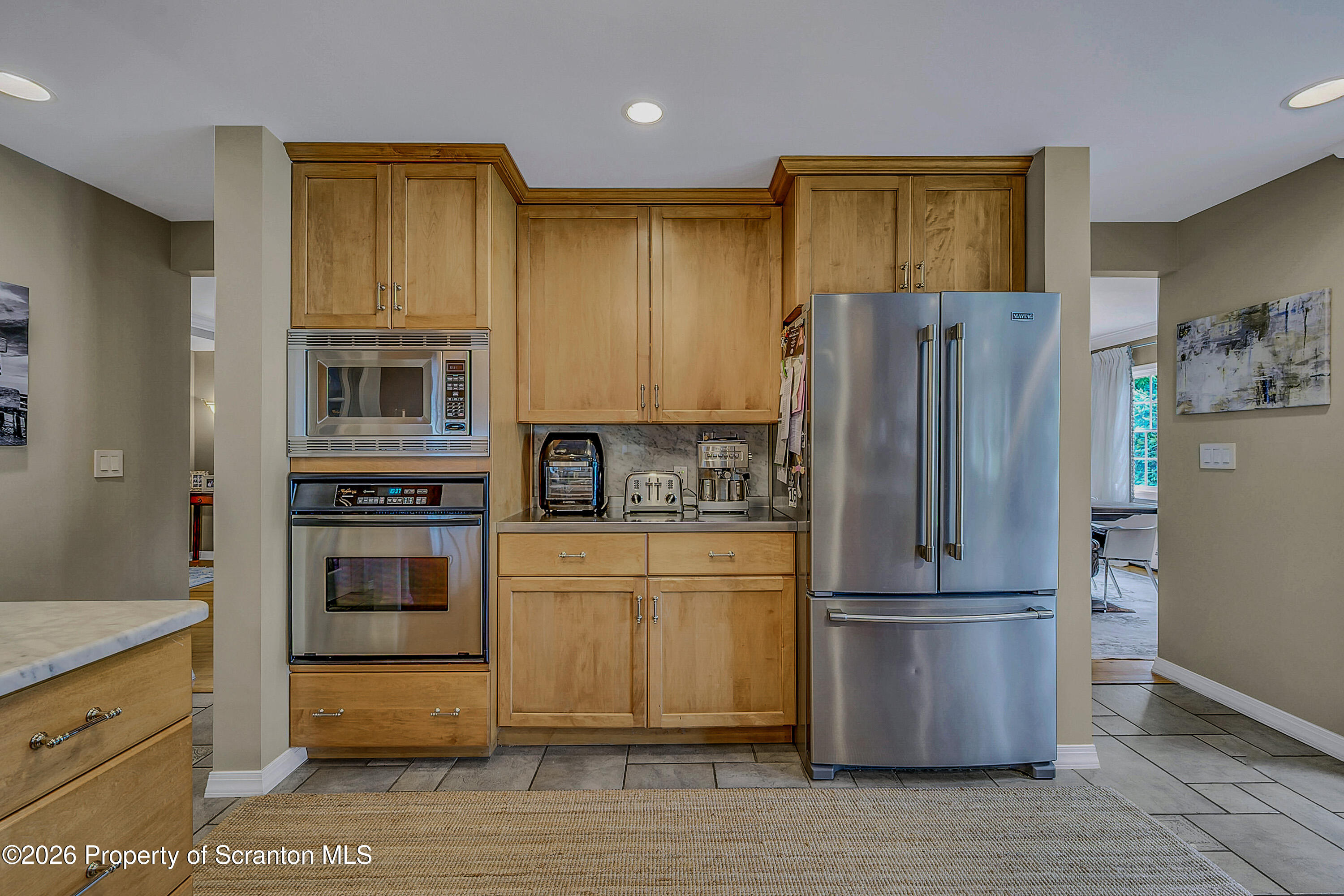 330 Glenburn Road Clarks Green, PA 18411 - Photo 31 of 69 a kitchen with stainless steel appliances granite countertop a refrigerator microwave and stove