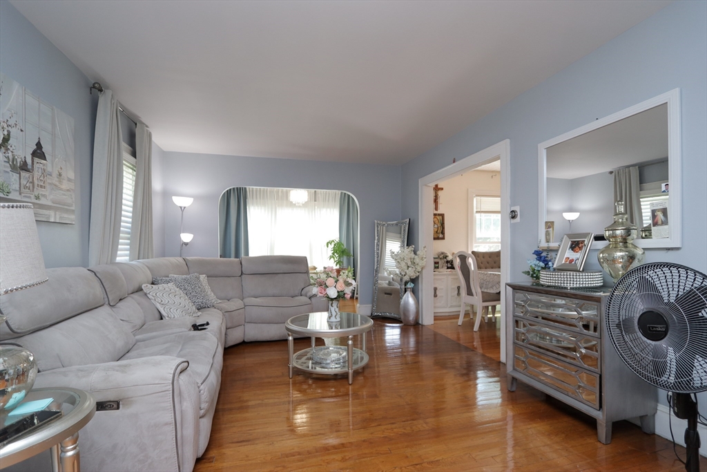 34 Preston Street Springfield, MA 01109 - Photo 7 of 34 a living room with furniture and a wooden floor