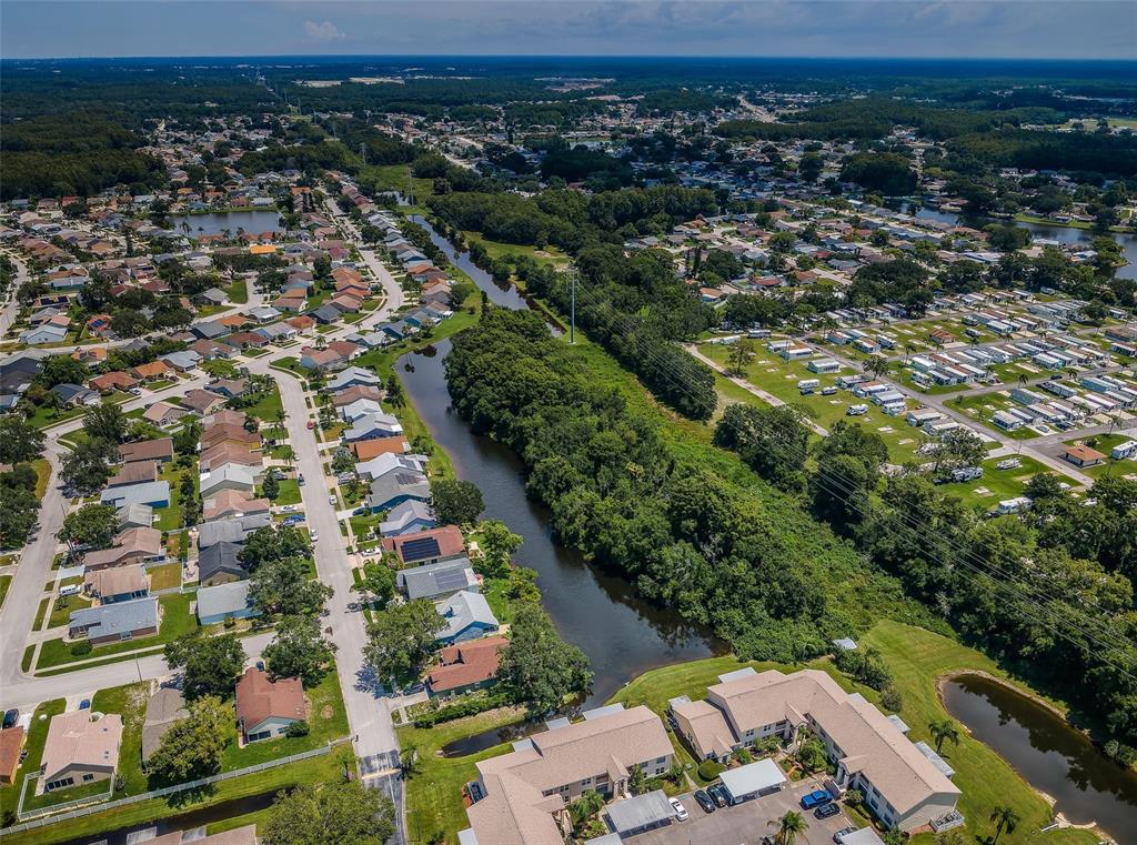 7911 Hardwick Drive, Unit 414 New Port Richey, FL 34653 - Photo 1 of 1 an aerial view of multiple house