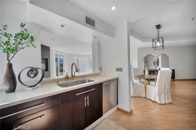 a kitchen with a sink and a stove