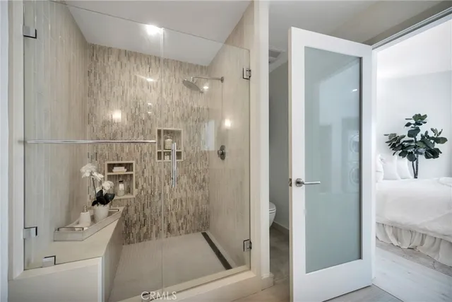 a bathroom with a shower curtain and a sink