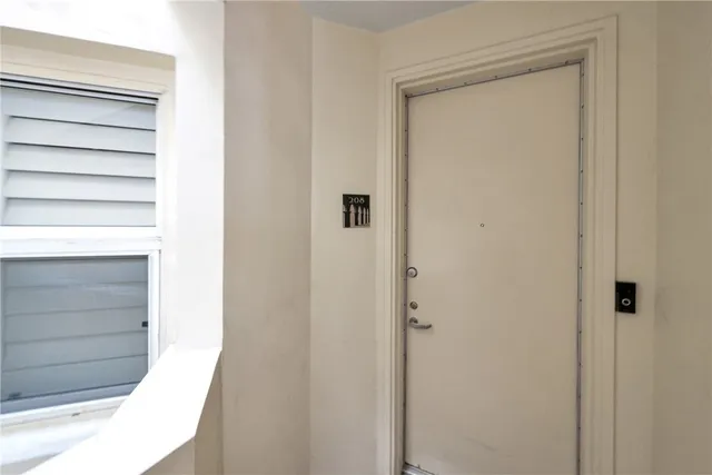 a view of a potted plant sitting in front of a house