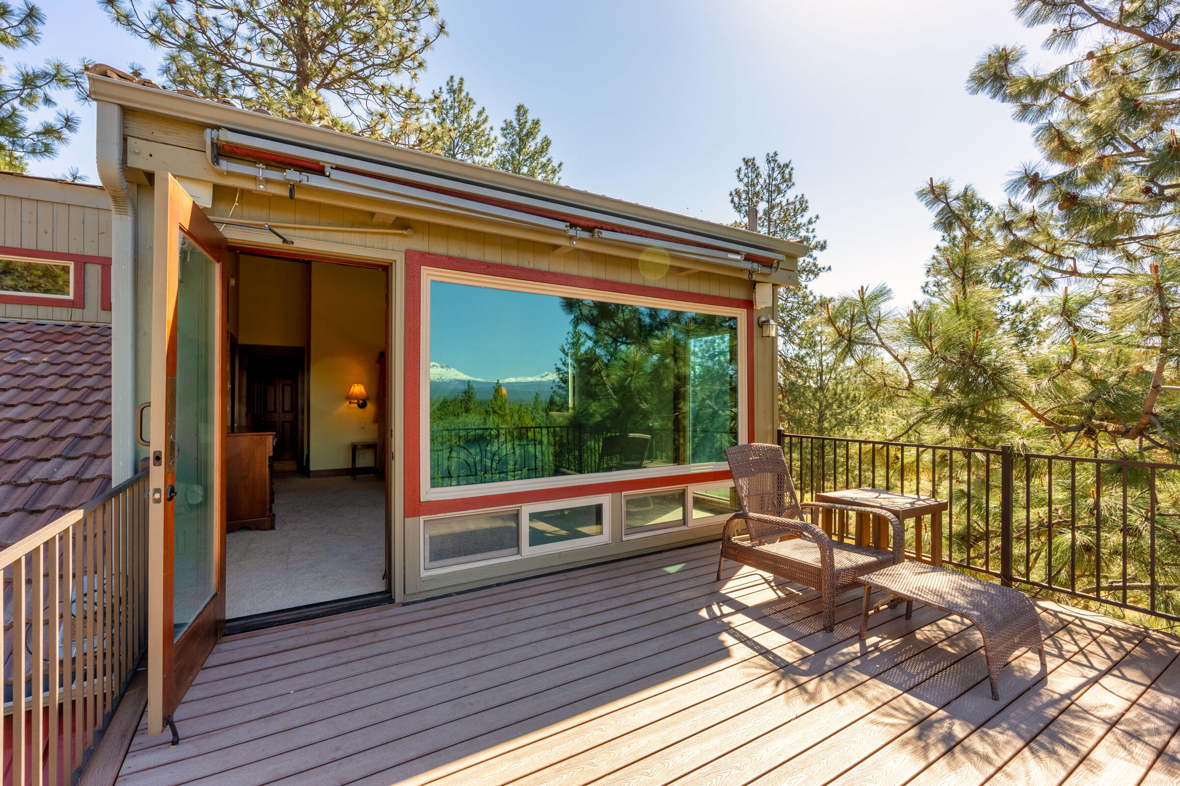 69470 Deer Ridge Road Sisters, OR 97759 - Photo 35 of 96 a view of a balcony with wooden floor and seating space