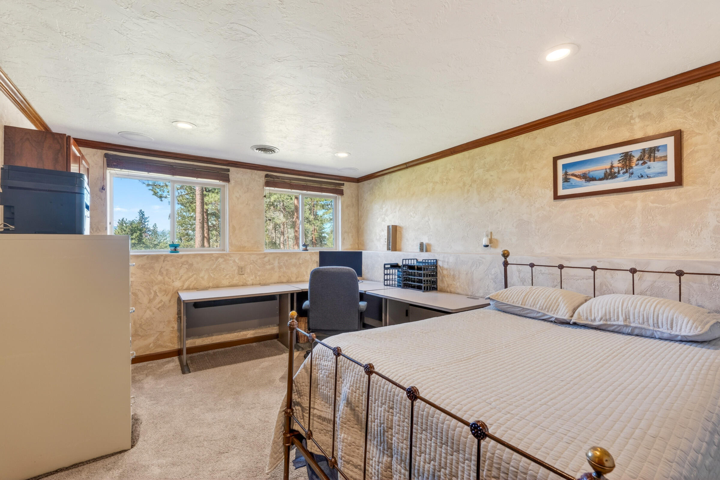 69470 Deer Ridge Road Sisters, OR 97759 - Photo 52 of 96 a bedroom with two beds and a large window