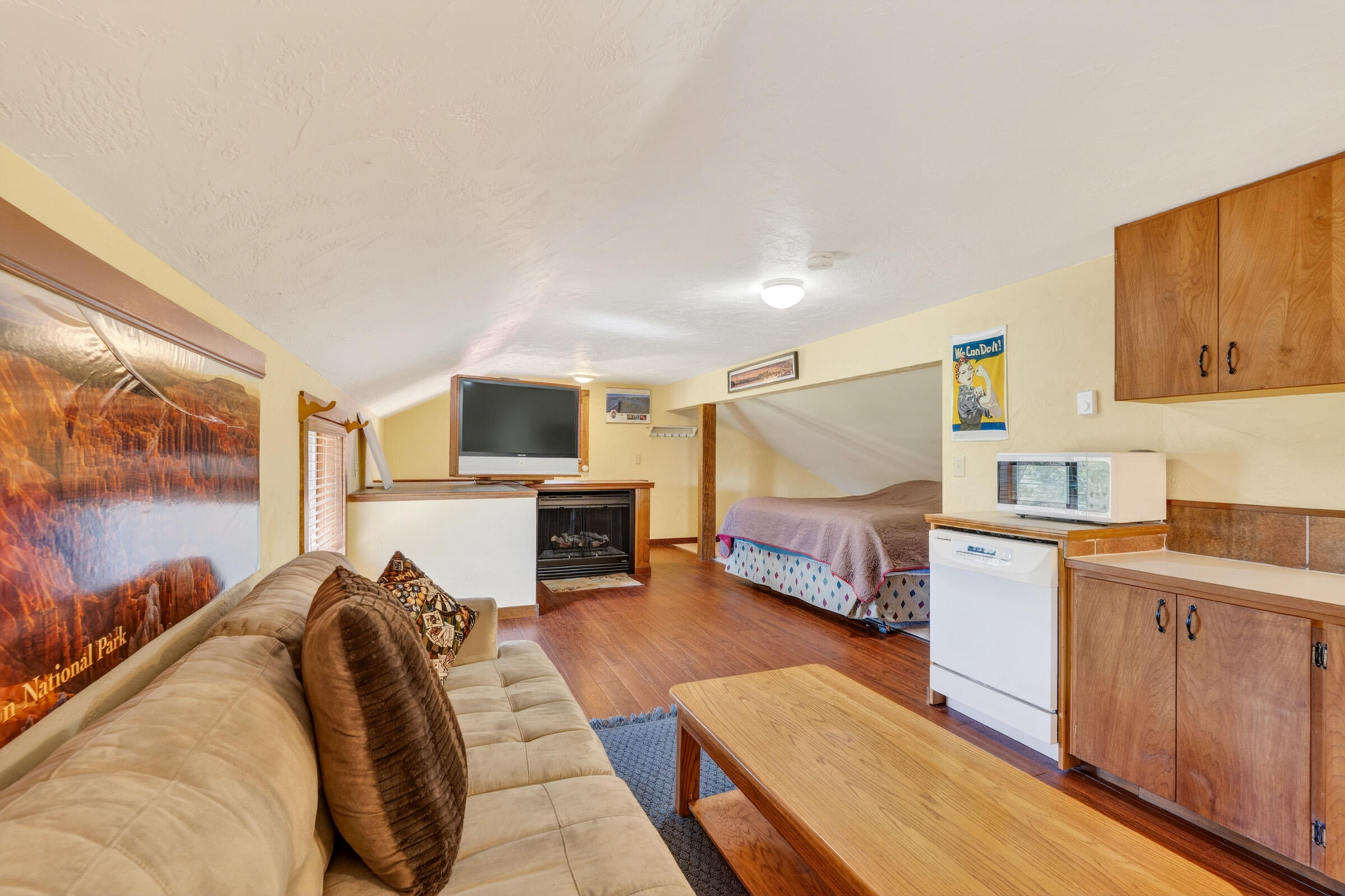 69470 Deer Ridge Road Sisters, OR 97759 - Photo 63 of 96 a bed room with a bed and a television