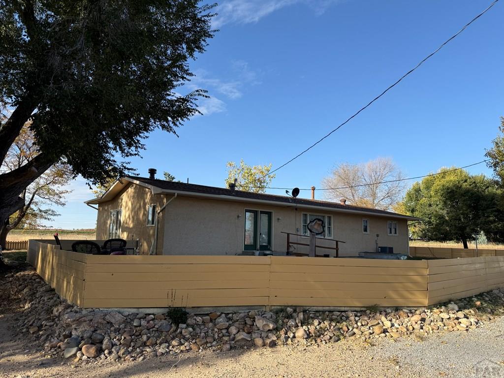 65281 Highway 50 Fowler, CO 81039 - Photo 3 of 16 a front view of a house with a yard