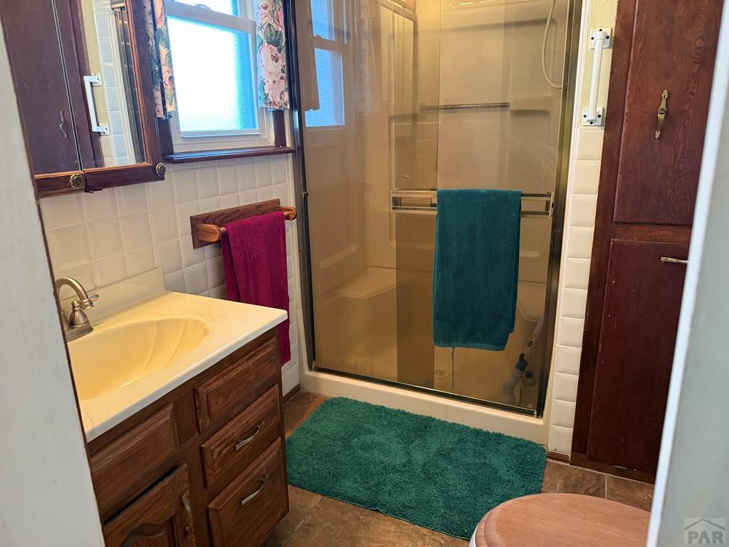 65281 Highway 50 Fowler, CO 81039 - Photo 9 of 16 a bathroom with a sink and a mirror