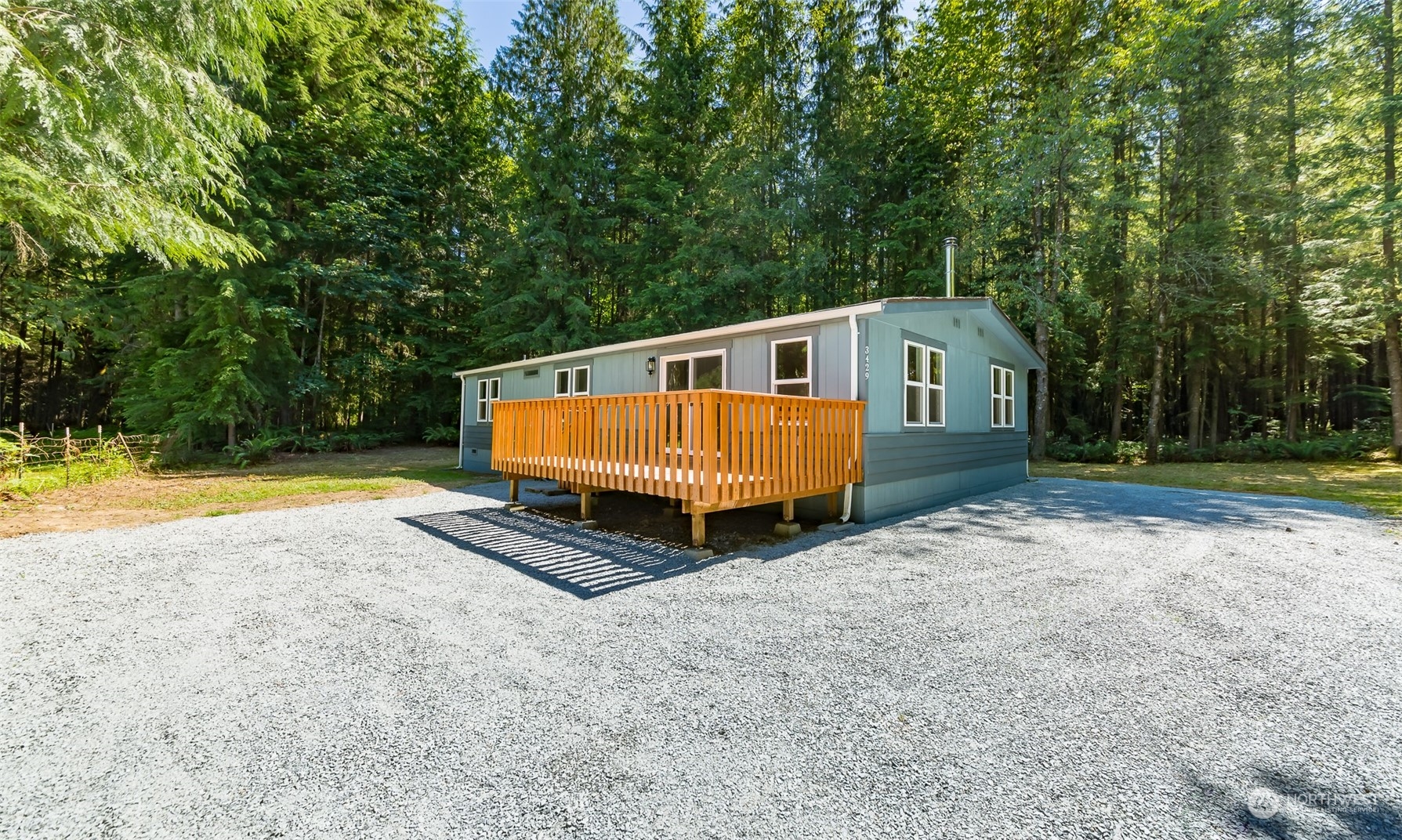 3429 Robe Menzel Road Granite Falls, WA 98252 - Photo 21 of 40 a view of a house with backyard and swimming pool