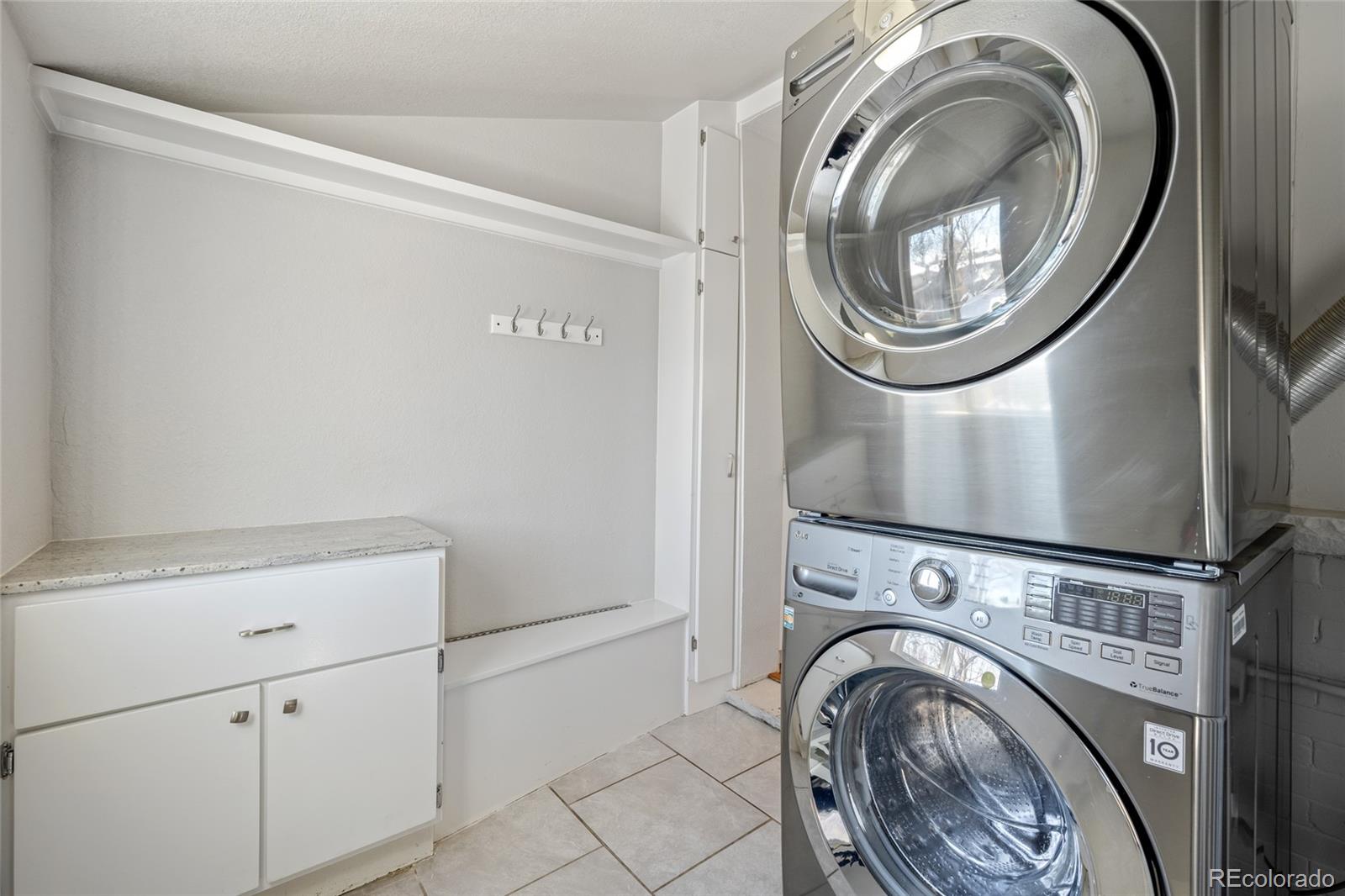 3340 Decatur Street Denver, CO 80211 - Photo 22 of 29 a utility room with dryer and washer