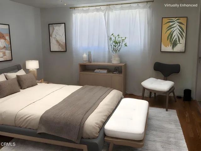 a view of a swimming pool with a patio and garden