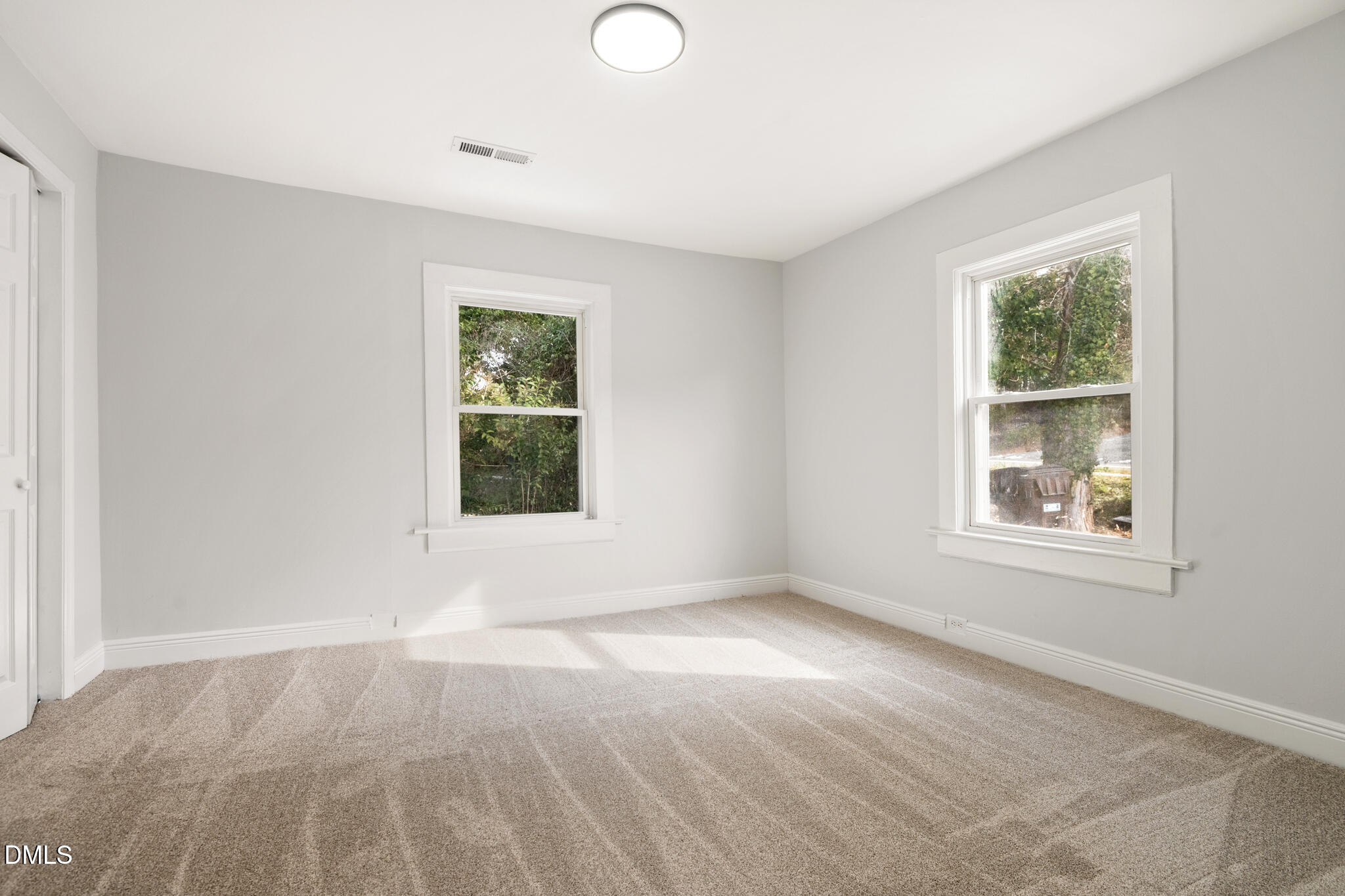 2705 Broad Street Durham, NC 27704 - Photo 18 of 33 an empty room with windows