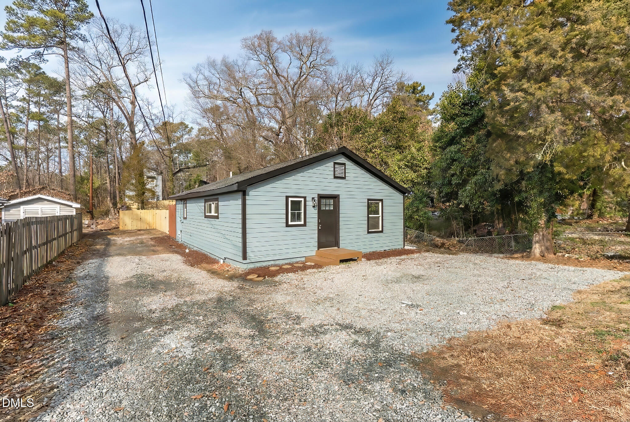 2705 Broad Street Durham, NC 27704 - Photo 2 of 33 a view of a house with a yard covered in snow
