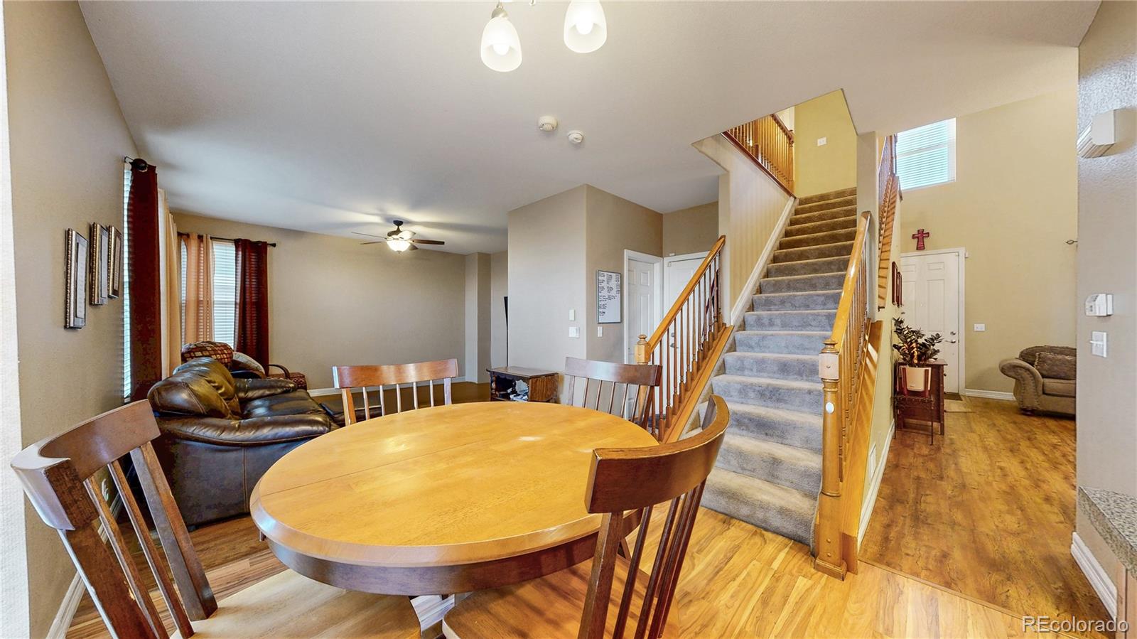 16159 Randolph Place Denver, CO 80239 - Photo 6 of 37 a view of a dining room with furniture