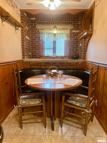 a view of a balcony with table and chairs