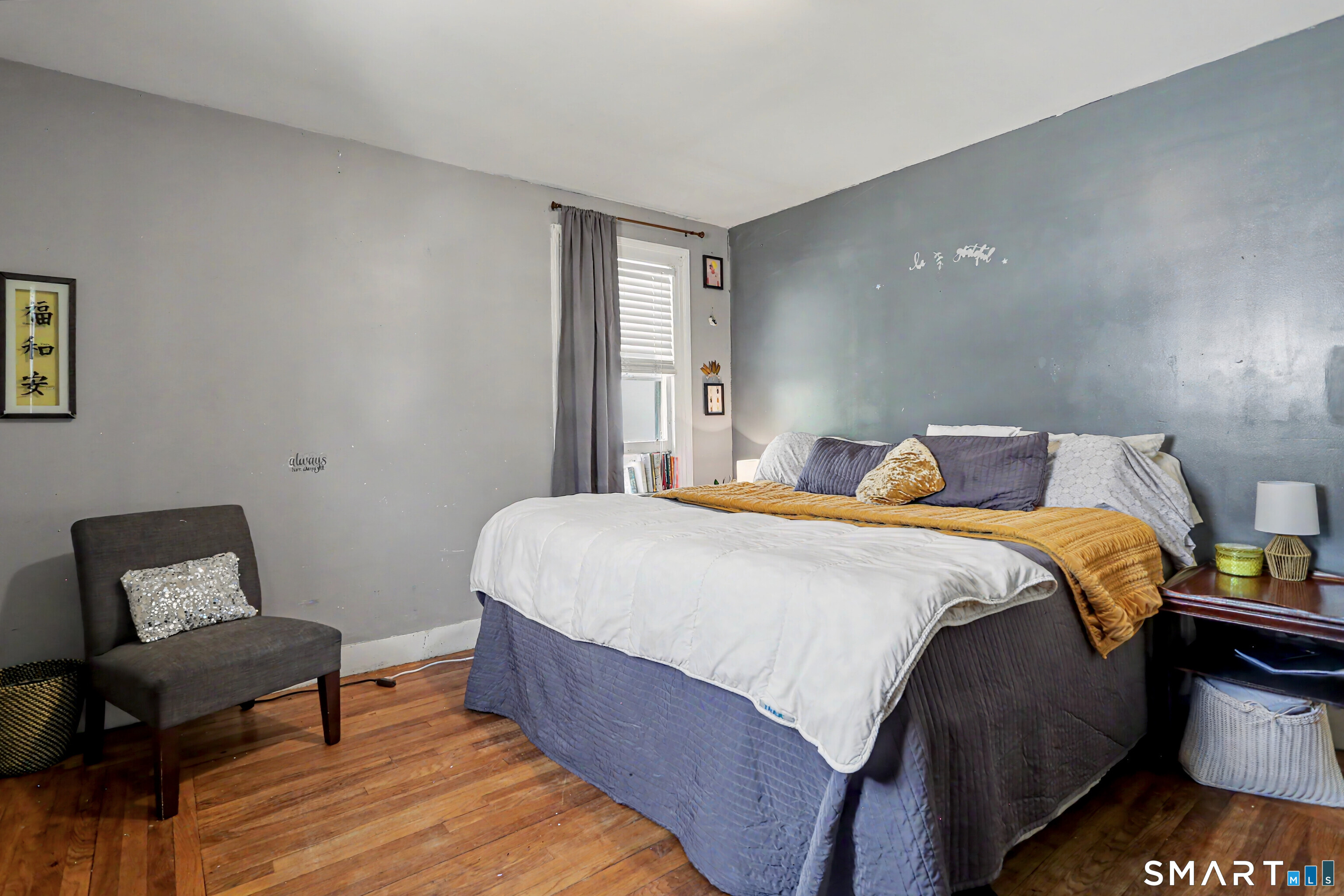 94 2nd Street Hamden, CT 06514 - Photo 22 of 31 a bedroom with a bed and chair