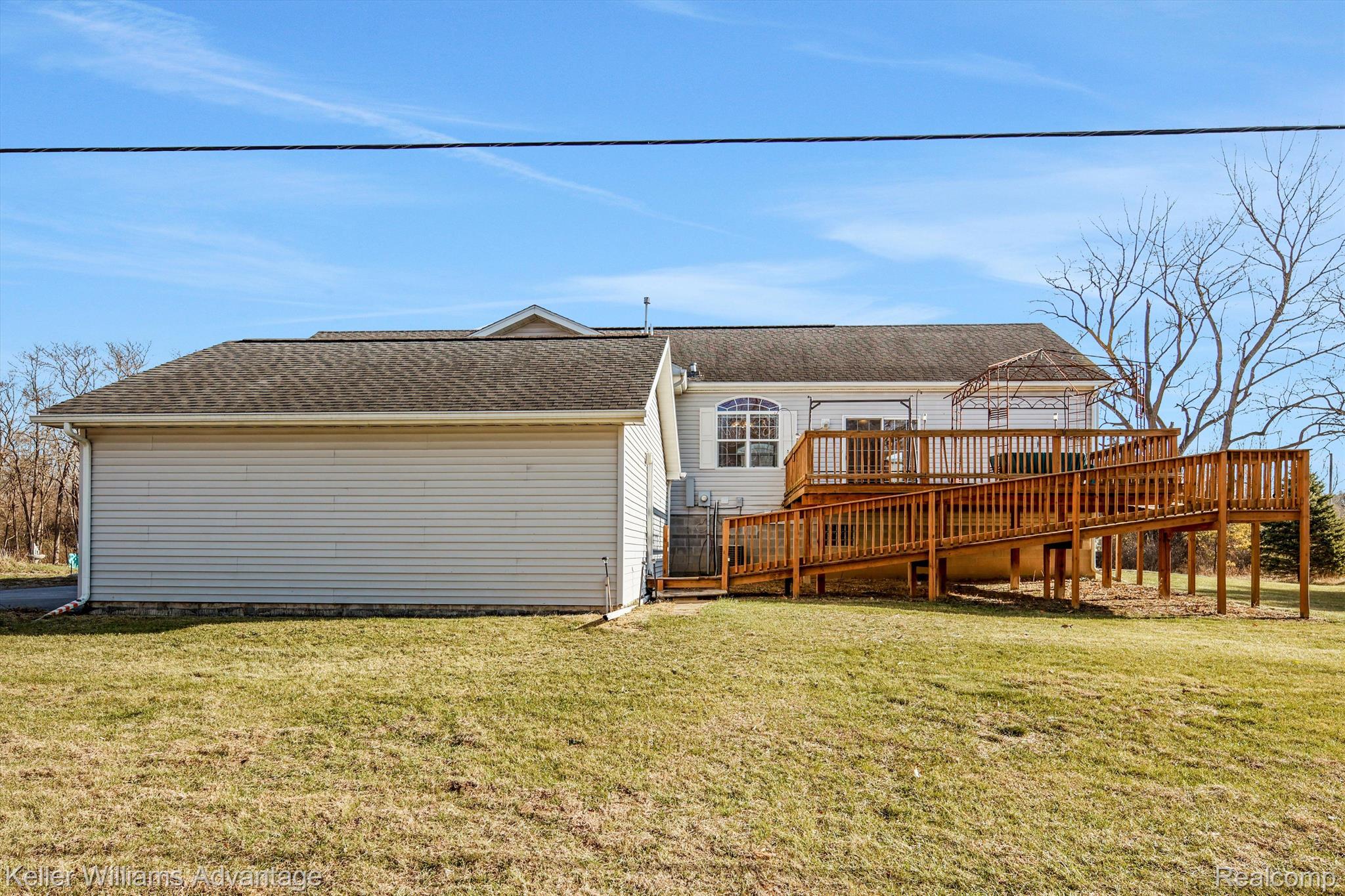 12242 Bunton Road Willis, MI 48191 - Photo 17 of 27 Side view of Deck
