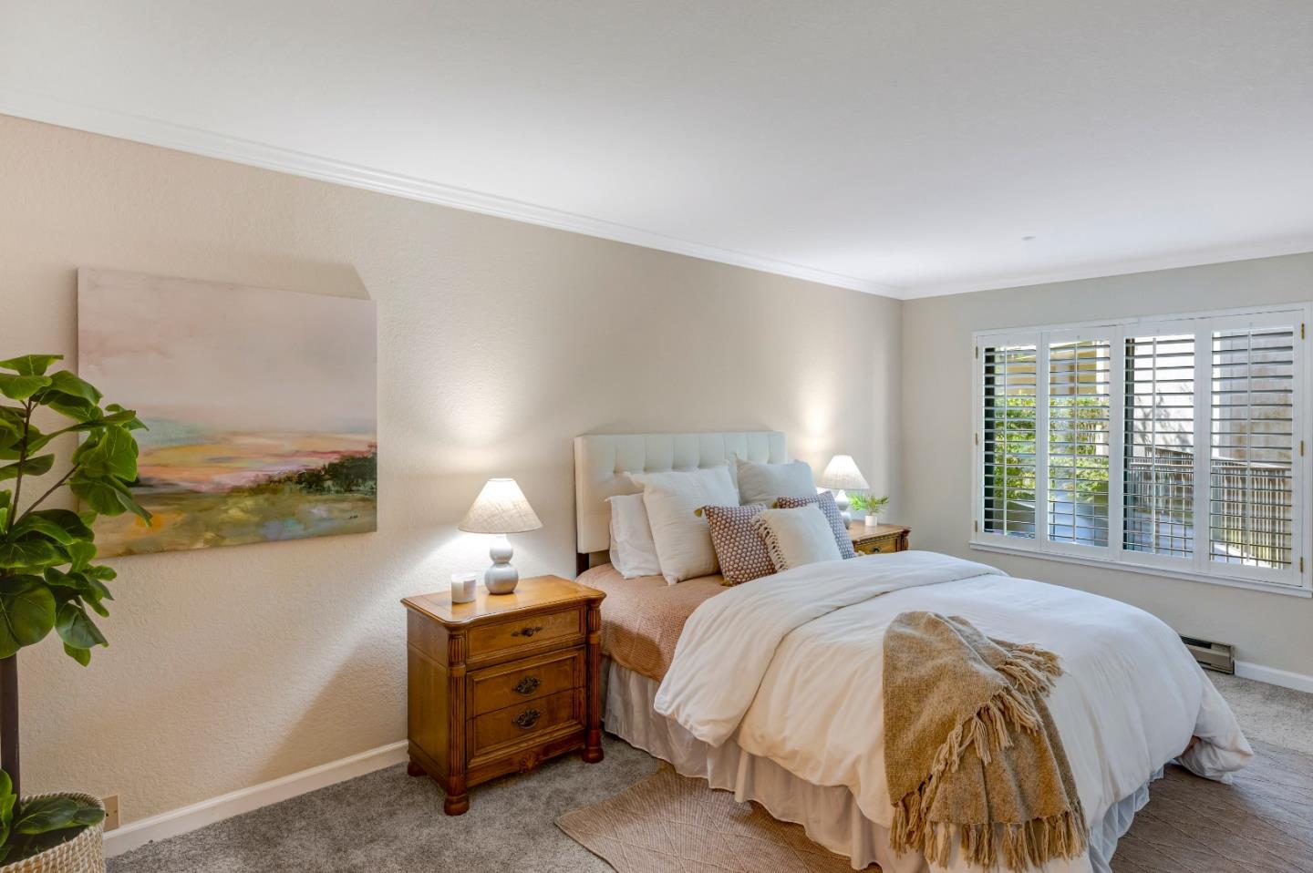 16 Shepherds Knoll Road Monterey, CA 93940 - Photo 12 of 18 a bedroom with a bed and a potted plant