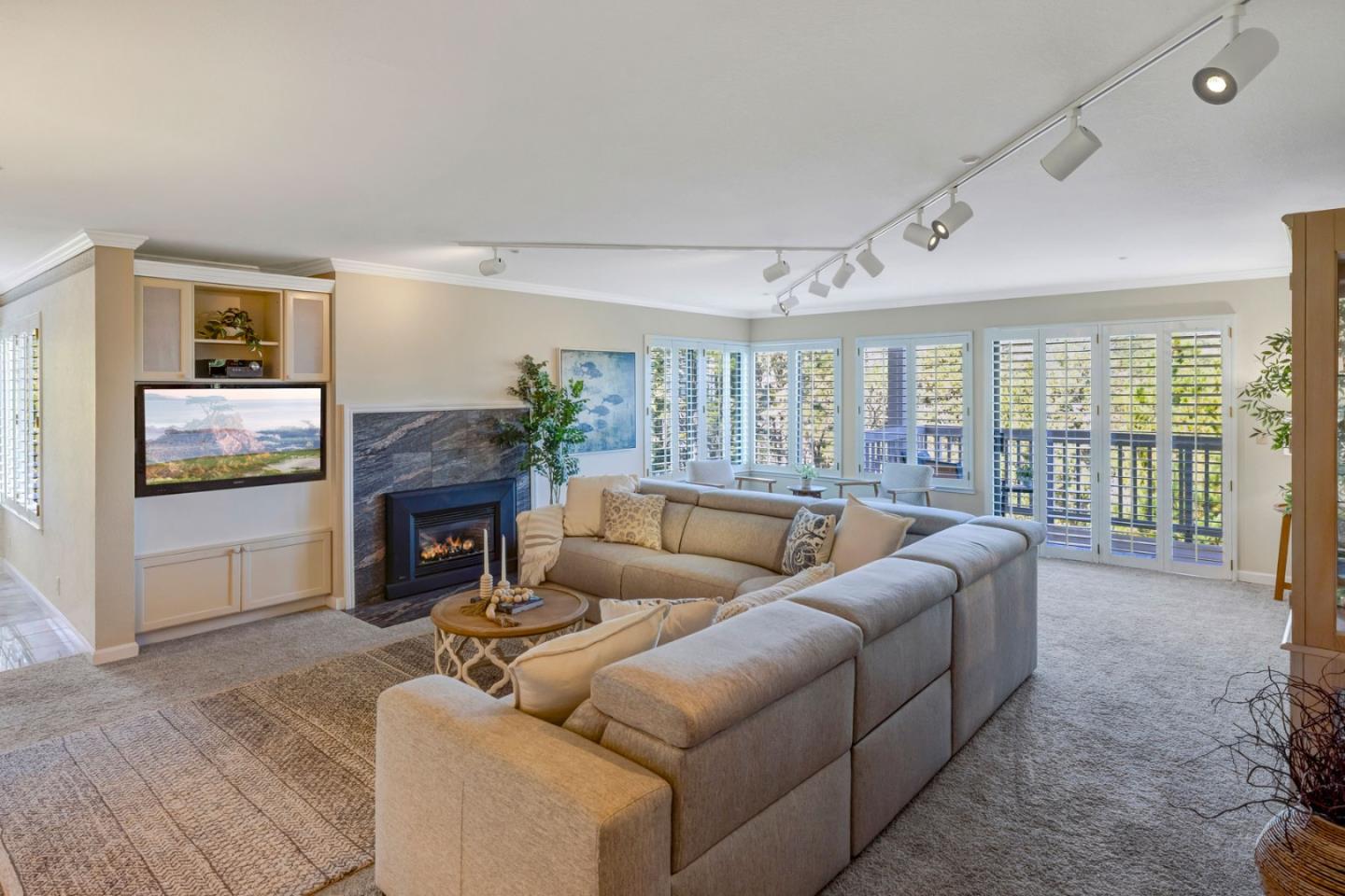 16 Shepherds Knoll Road Monterey, CA 93940 - Photo 3 of 18 a living room with furniture and a fireplace