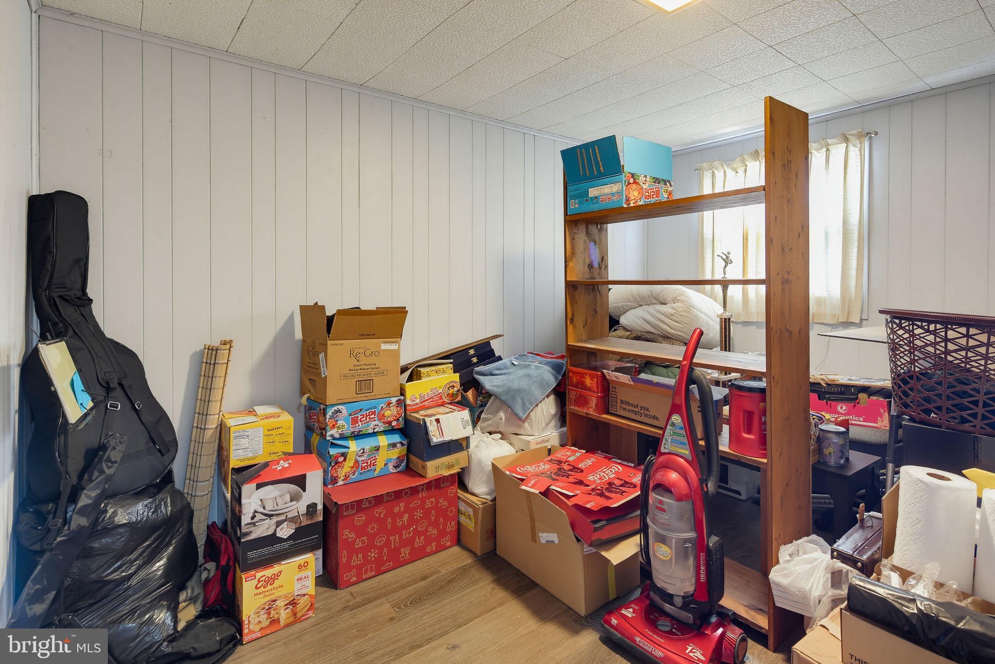 7802 Bastille Road Severn, MD 21144 - Photo 28 of 34 Cluttered space with potential charm.