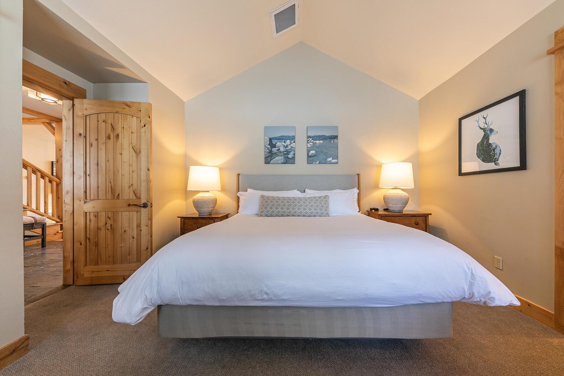 12339 Lookout Loop, Unit F0638 Truckee, CA 96161 - Photo 19 of 27 a bedroom with a bed and lamp